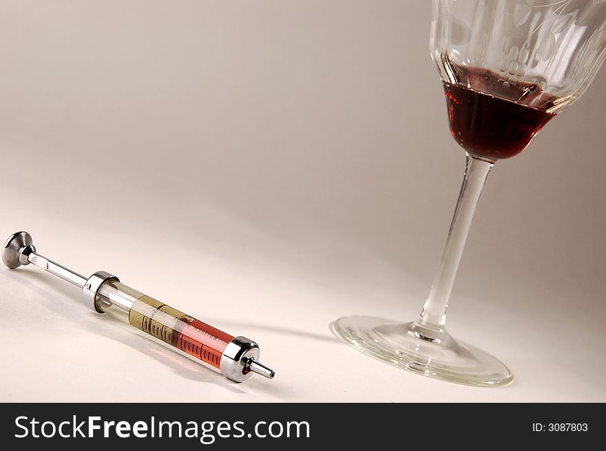 Photo of wine glasses and injection