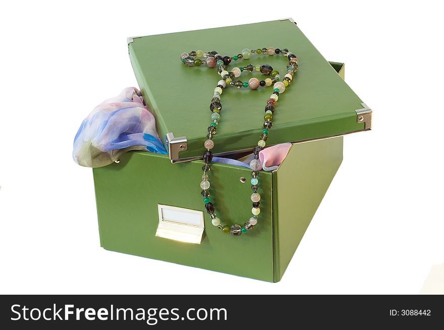 Green box with glassbeads on it and neckerchief. Green box with glassbeads on it and neckerchief