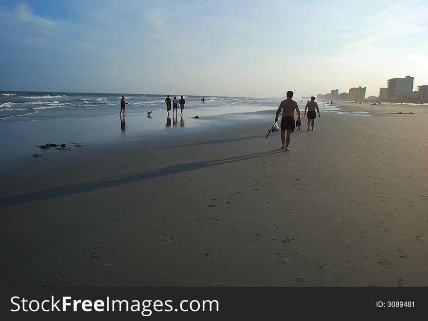 People walking on beach