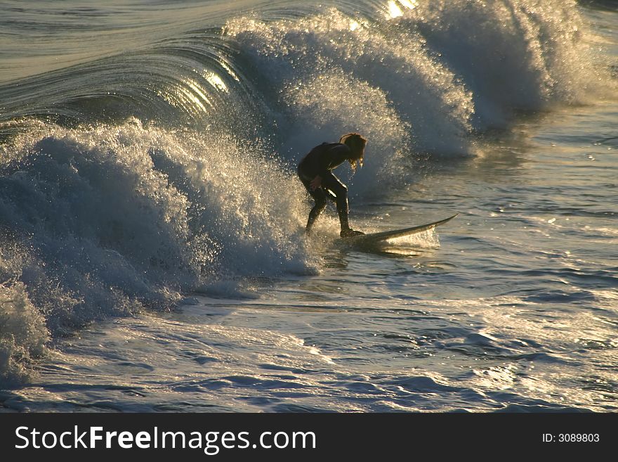 Man surfing on wave in the water. Man surfing on wave in the water