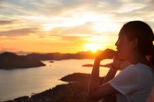 Side Portrait Of Girl Making Phonecall When Sunset Stock Photo Side Portrait Of Girl Making Phonecall When Sunset Stock Photo