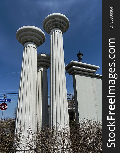 Modern colums in front of a new construction area