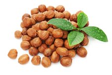 Heap Of Fresh Shelled Hazelnuts With Green Leaves. Royalty Free Stock Photo Heap Of Fresh Shelled Hazelnuts With Green Leaves. Royalty Free Stock Photo