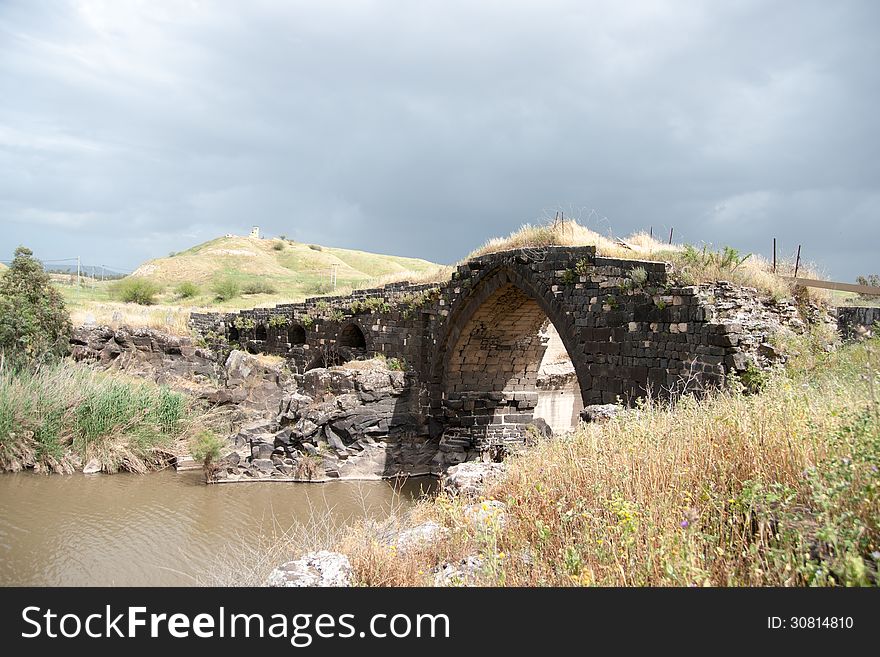 Old roman bridge over Jordan river. Old roman bridge over Jordan river