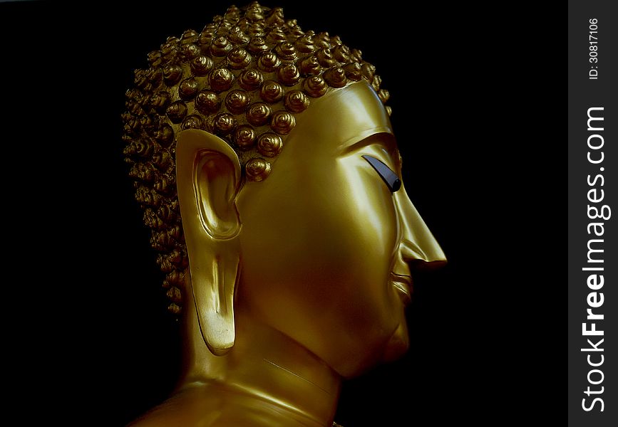 Buddha in black background from Thailand