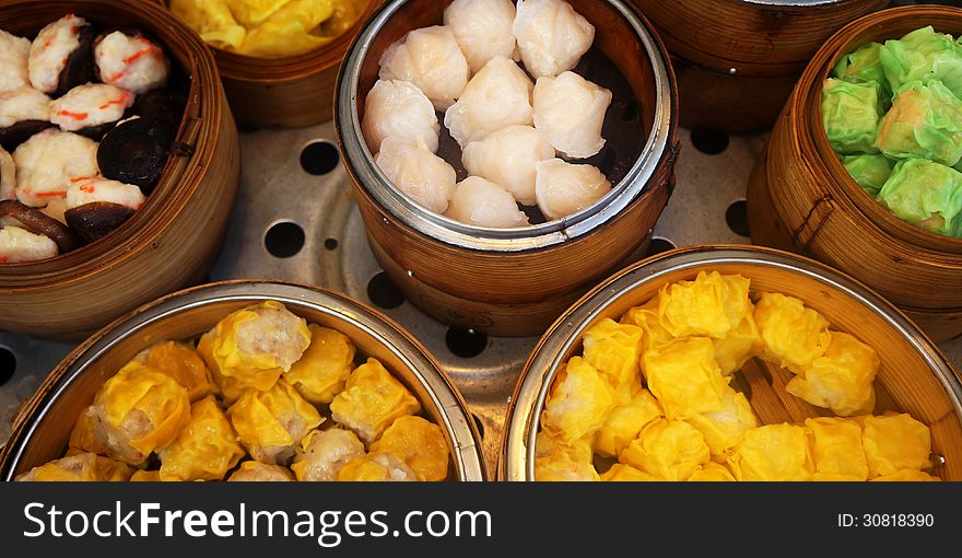 Chinese appetizer, in a bamboo dish. Chinese appetizer, in a bamboo dish.