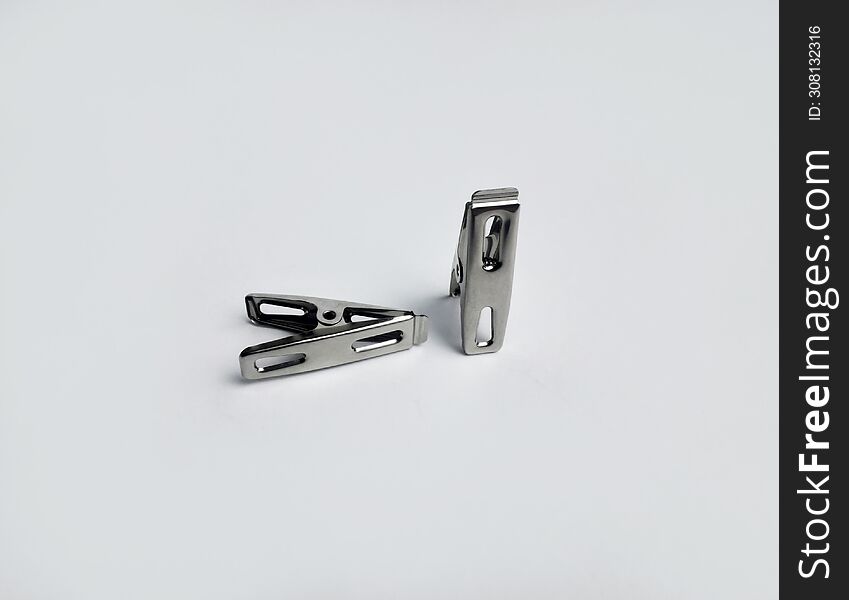 Clothes Pegs Made Of Anti-rust Stainless Steel And Isolated White Background