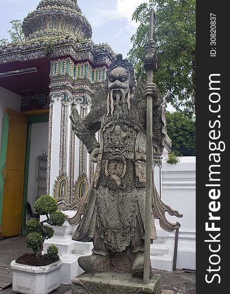 Statue in a complex of temple Wat Pho, Bangkok, Thailand