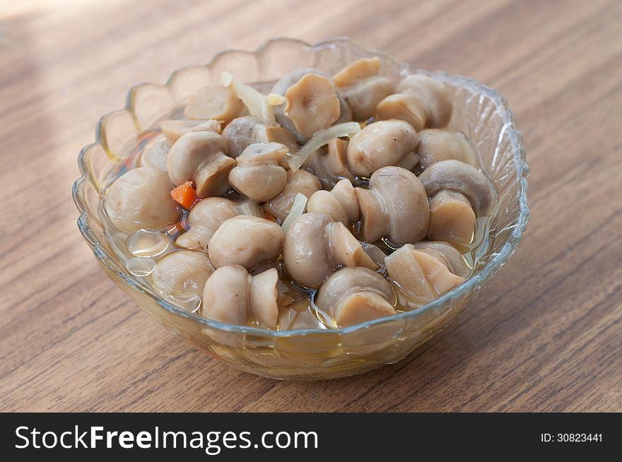 Pickled mushrooms on a table