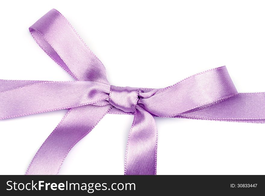 Lilac Satin Bow on white background. Lilac Satin Bow on white background