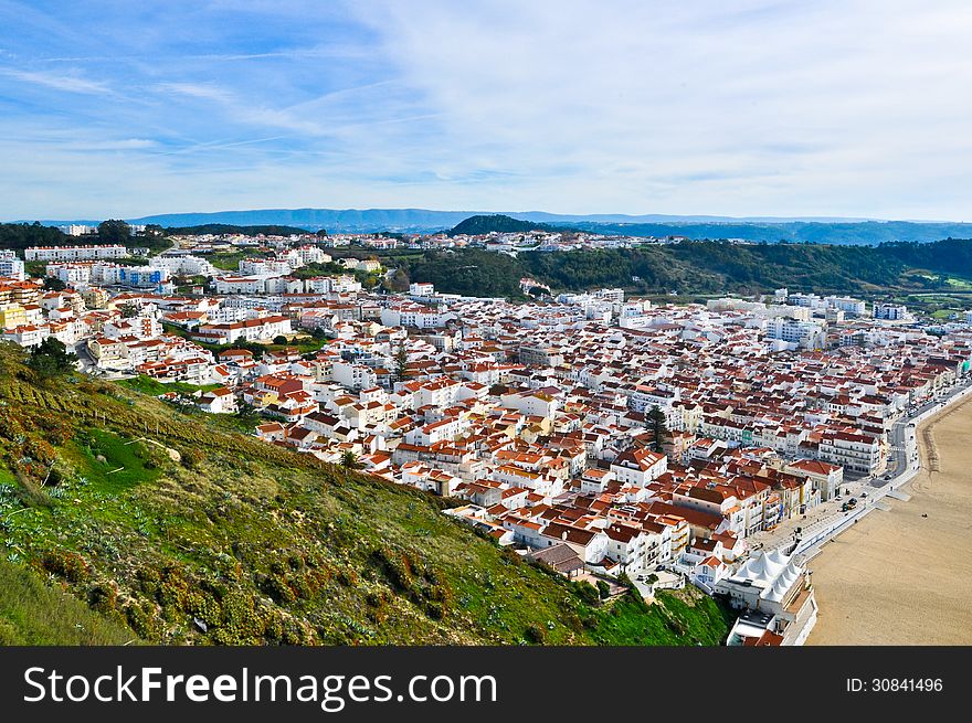 Aerial view of a resort town of Nazare in Portugal. Aerial view of a resort town of Nazare in Portugal.
