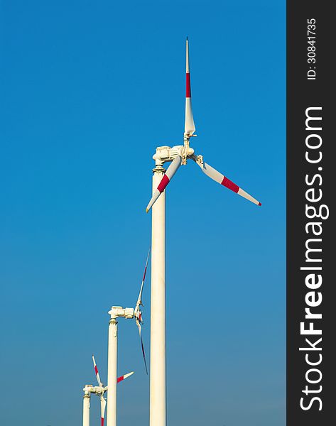 Wind turbine for generating electricity on blue sky