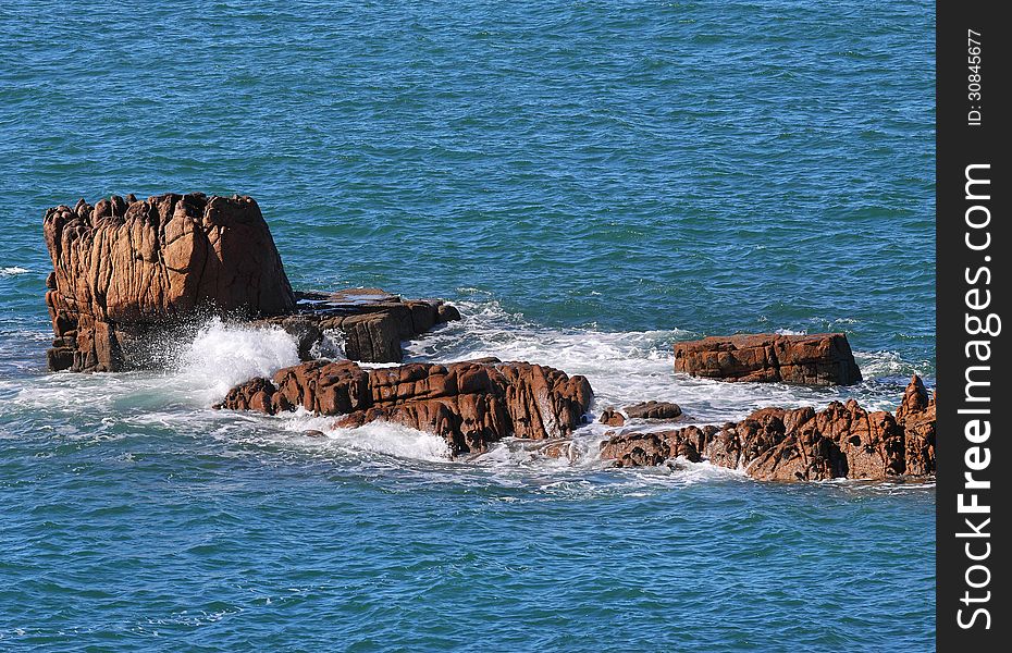 Coastal Scene In Guernsey With  Rocks