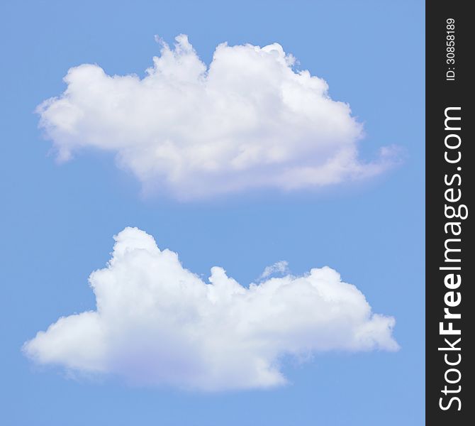 Two clouds with blue sky background