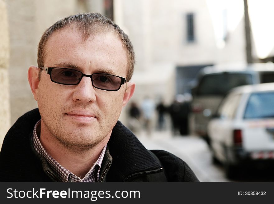 Street portrait of 35 years old man