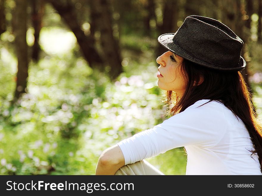 Portrait of beautifull 35 years old woman in spring forest