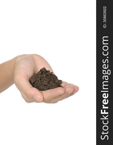 Woman hand hold soil isolated over white background. Woman hand hold soil isolated over white background