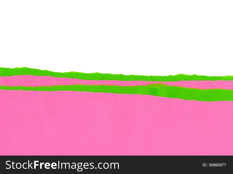 Pink and green strips of paper with the ragged edge
