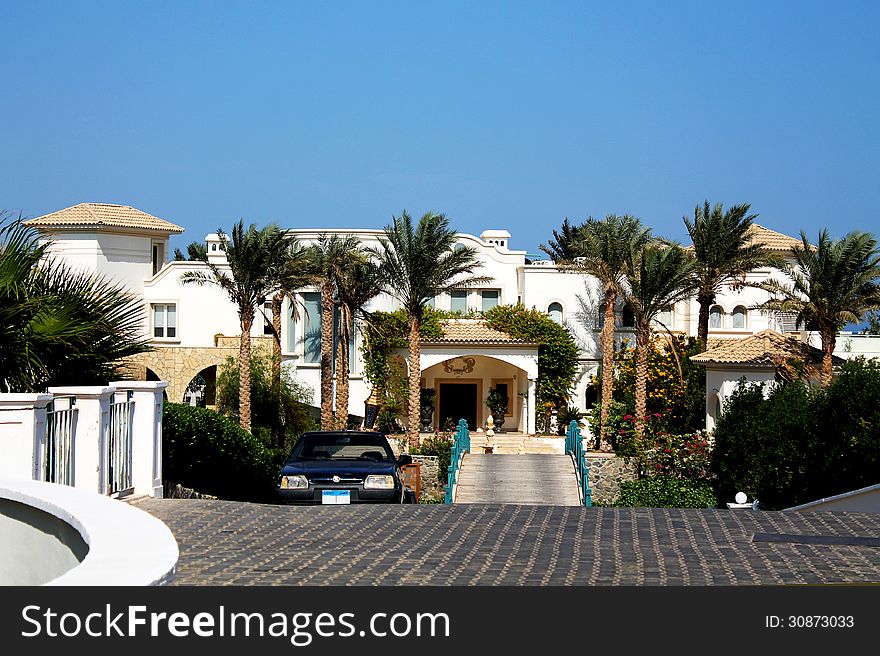 Villa on the Bay, surrounded by palm trees. Villa on the Bay, surrounded by palm trees