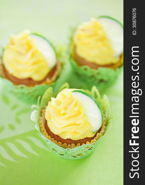 Lime cupcake with lemon cream, soft focus