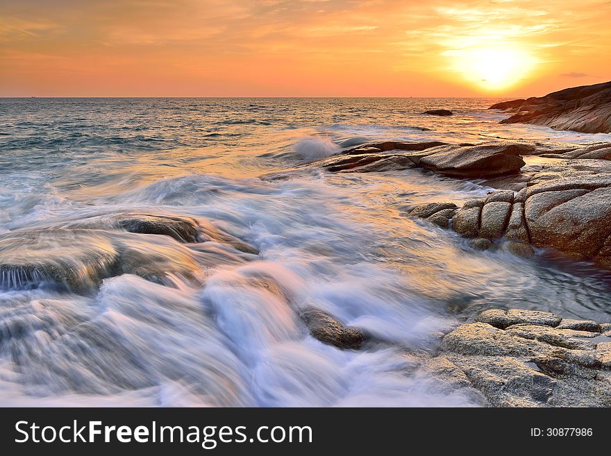 Sea wave on the beach at sunset time. Sea wave on the beach at sunset time