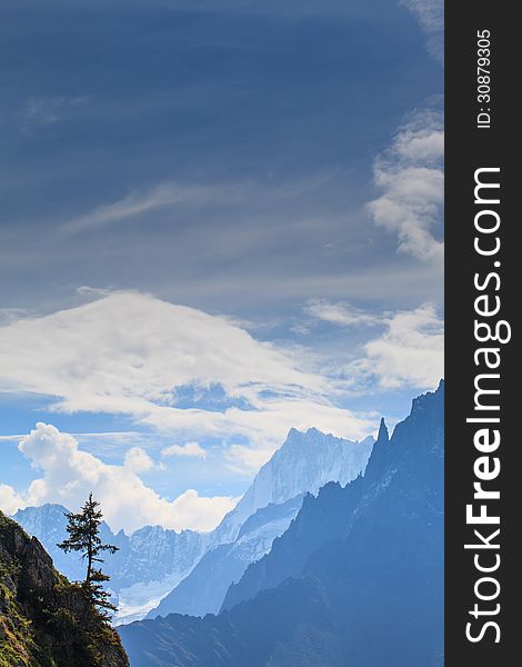 Snow covered mountains and rocky peaks in the French Alps