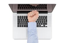 Top View Of Modern Retina Laptop With A Man S Fist Pointing At T Royalty Free Stock Images Top View Of Modern Retina Laptop With A Man S Fist Pointing At T Royalty Free Stock Images