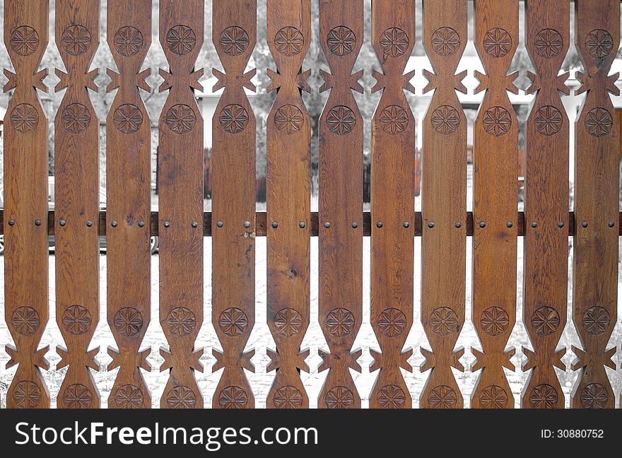 Closeup of a traditional wooden gate from Lainici Monastery
