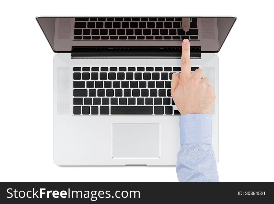 Top view of modern retina laptop with a man's hand pointing at the screen on white background. You can put any image on the screen, while retaining reflection of keyboard. Top view of modern retina laptop with a man's hand pointing at the screen on white background. You can put any image on the screen, while retaining reflection of keyboard.