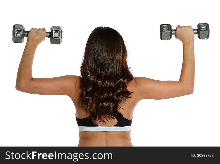 Young Brunette Woman working out with dumbells isolated on a white background