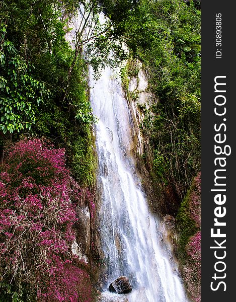 Waterfall near Tomok village. Samosir Island, Lake Toba, North Sumatra, Indonesia.