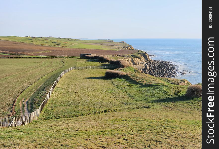 Fields and a fence on the cliff at Cap Gris Nez on the french coast Cote dOpale. Fields and a fence on the cliff at Cap Gris Nez on the french coast Cote dOpale