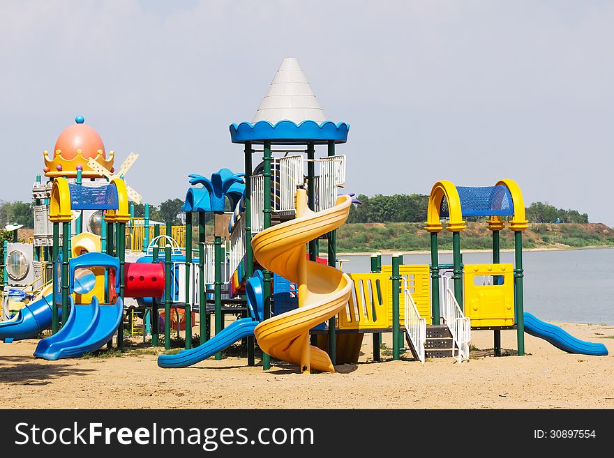 Modern children playground in park without children