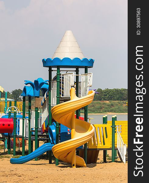 Modern children playground in park without children