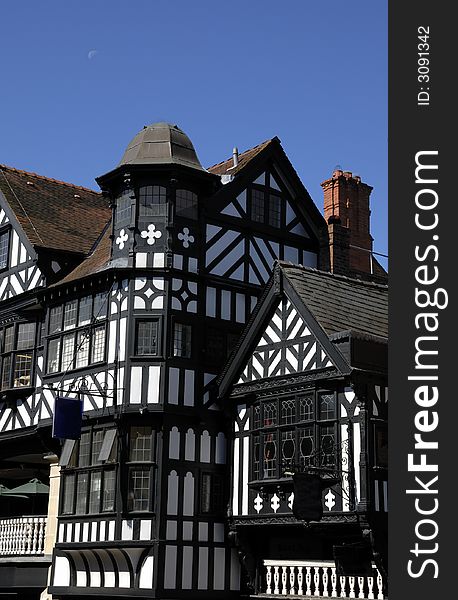 Old black and white tudor building in Chester England showing leaded windows and turret. Old black and white tudor building in Chester England showing leaded windows and turret.