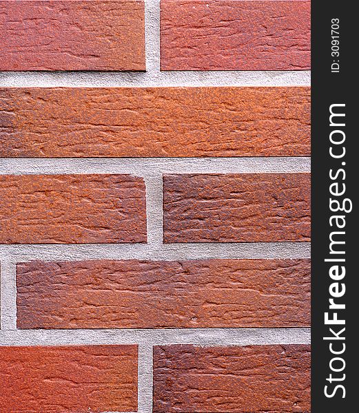 Red and orange brick wall texture. Red and orange brick wall texture