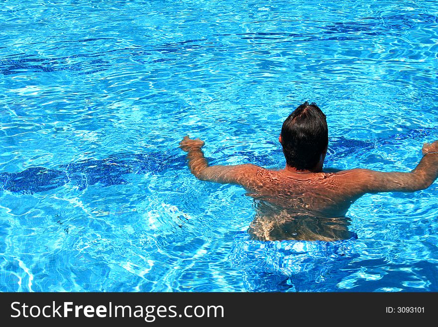 Relax in the pool in the resort