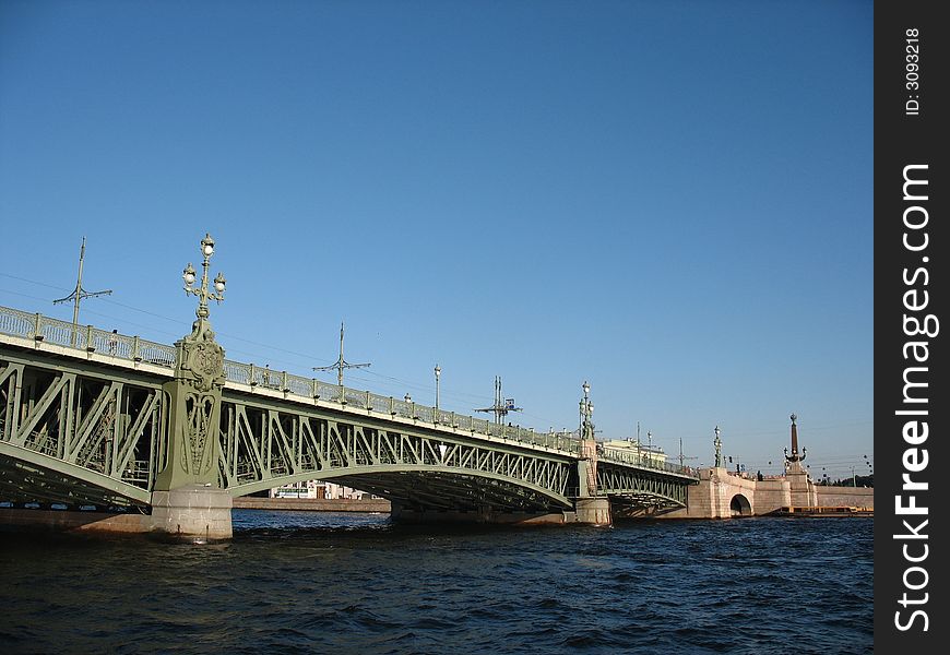 The bridge through the river. The bridge through the river