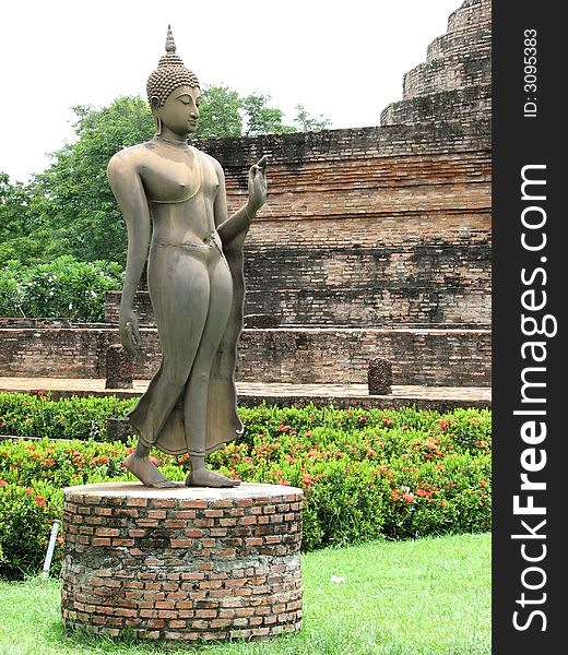 This is an androgyynous Buddhist Arhat, an enligtened helper of the Buddha, in teh ruins of Sukhothai, Thailand. This is an androgyynous Buddhist Arhat, an enligtened helper of the Buddha, in teh ruins of Sukhothai, Thailand.