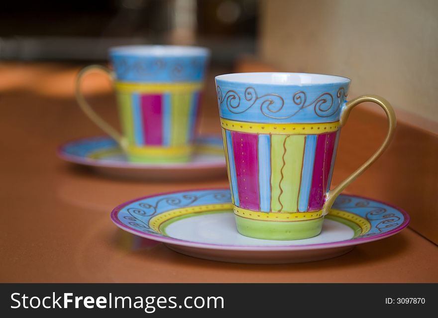 Tea cups photographed with selective focus. Tea cups photographed with selective focus.