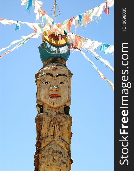 Wooden statue craft by minority ethnic in Yun Nan China