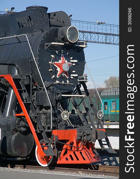 Old Russian locomotive at the railway station. Old Russian locomotive at the railway station