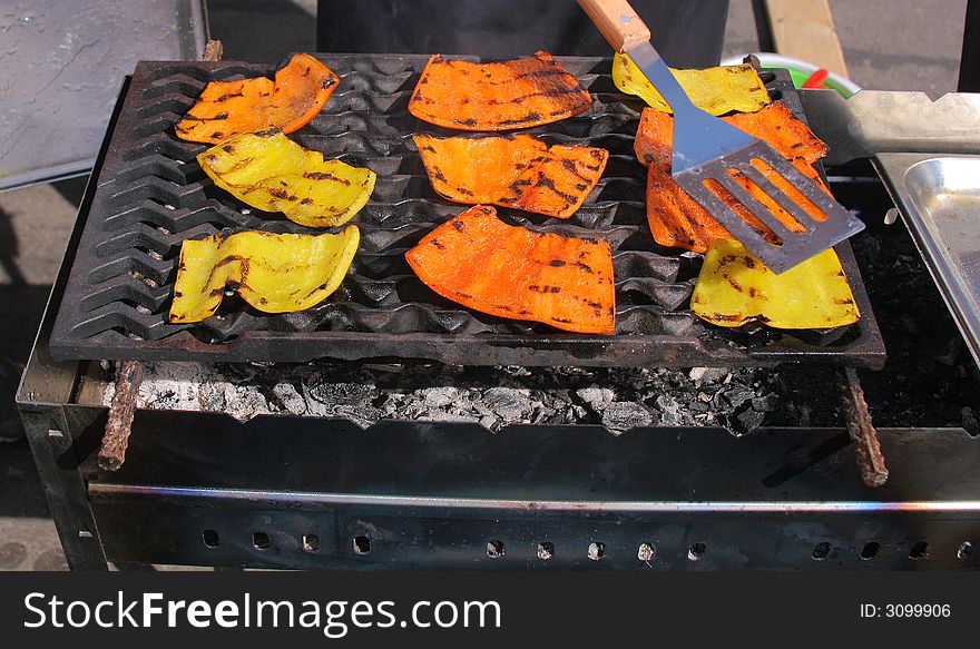 Paprika grilled on BBQ grill outdoors at picnic. Paprika grilled on BBQ grill outdoors at picnic