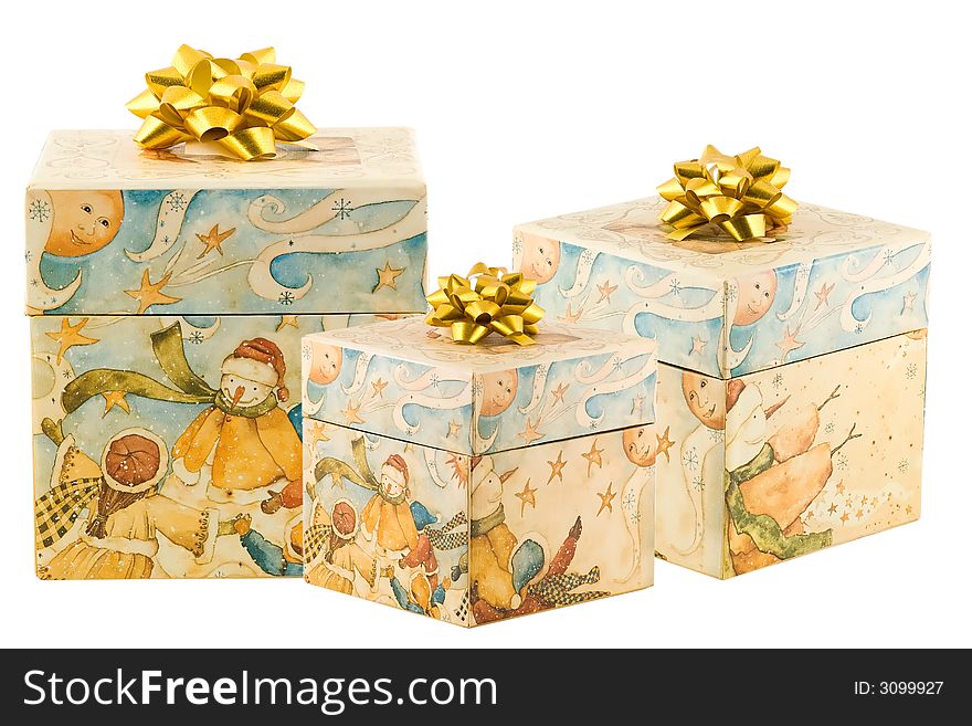 Three presents with gold bows on white