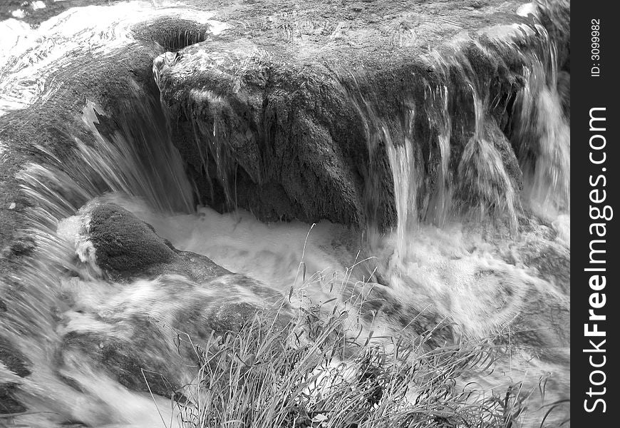 Waterfall in a national park, greyscale image