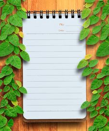 Blank Planning Notebook On Wood Background With Ivy Fixing Tree. Stock Photography Blank Planning Notebook On Wood Background With Ivy Fixing Tree. Stock Photography