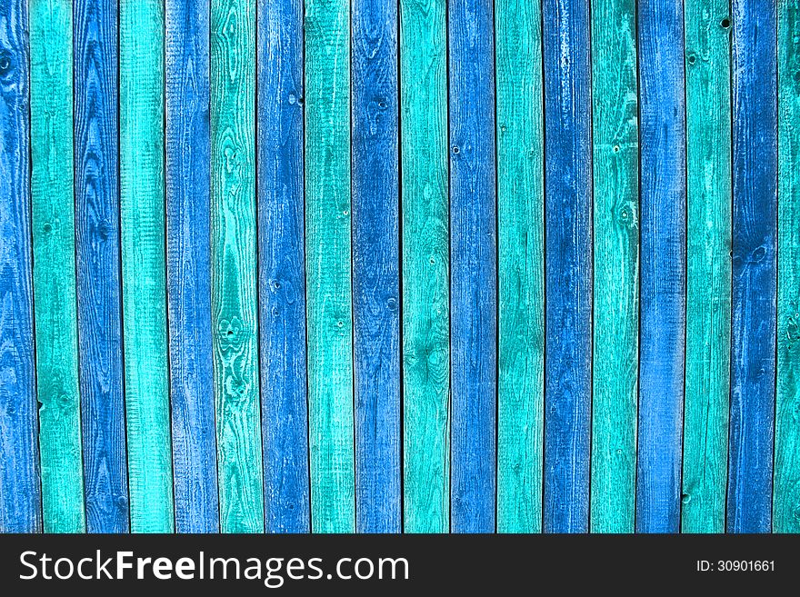 Old painted wooden planks in blue and green. Old painted wooden planks in blue and green