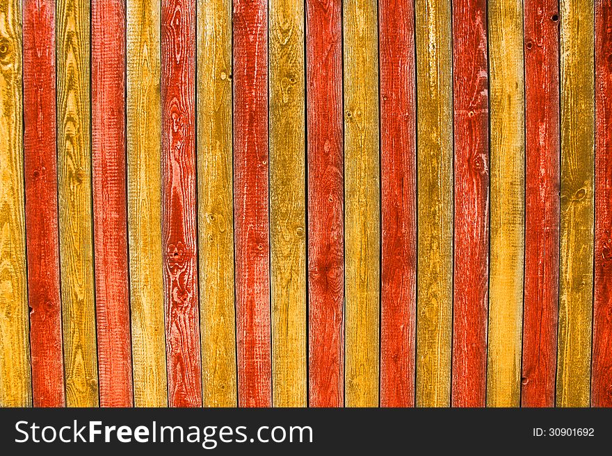 Old painted wooden planks in orange and red. Old painted wooden planks in orange and red