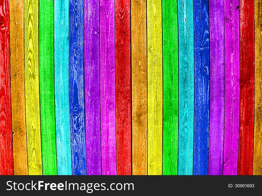 Old painted wooden planks in rainbow colors. Old painted wooden planks in rainbow colors
