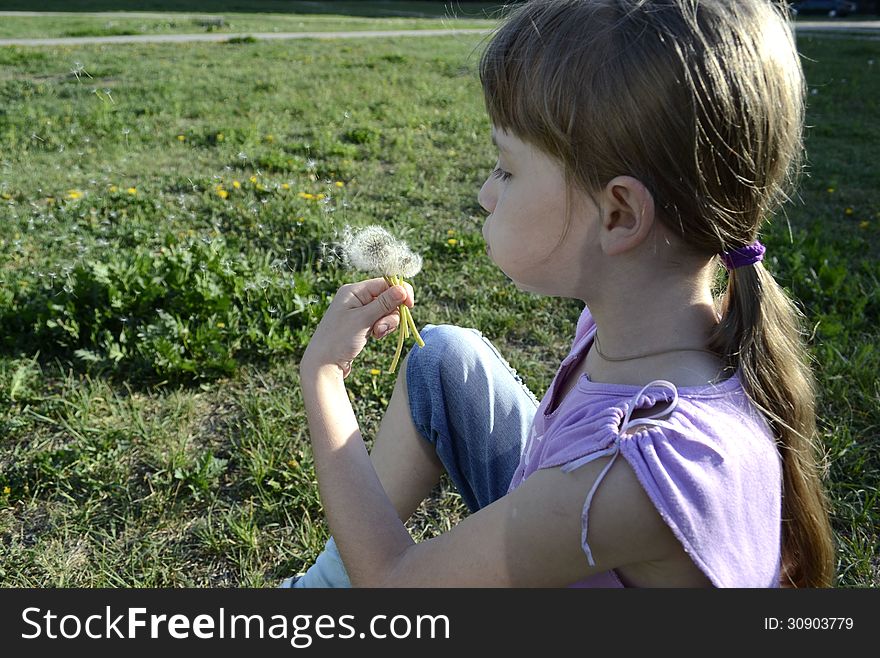 Girl with dandelion